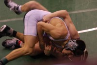 2011 State wrestling pictures 090 Ryan Harris struggles with his opponent at the state tournament. Photo courtesy of Debbie Harris